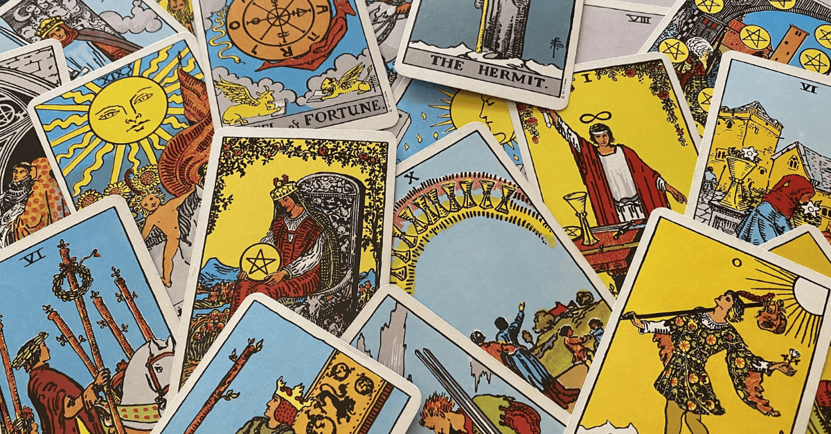 A group of tarot cards are laying on top of each other. brand storytelling